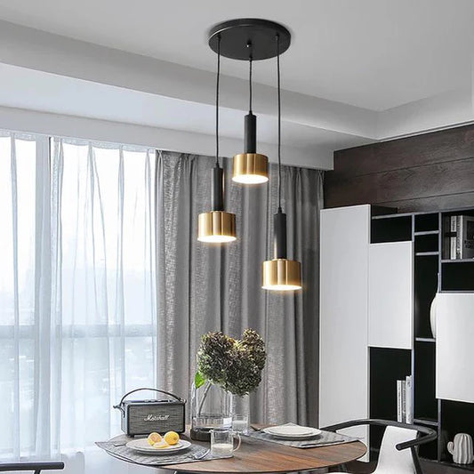Suspension moderne 3 lumières noir et or