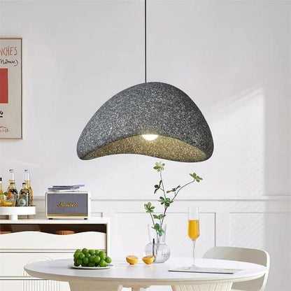 Suspension design en finition pierre artisanale