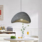 Suspension design en finition pierre artisanale