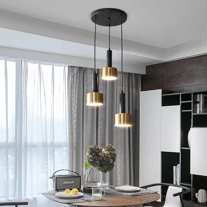 Suspension moderne 3 lumières noir et or