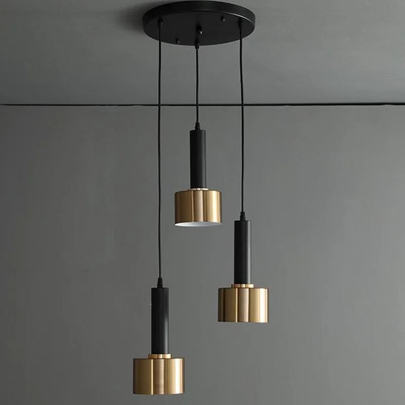 Suspension moderne 3 lumières noir et or